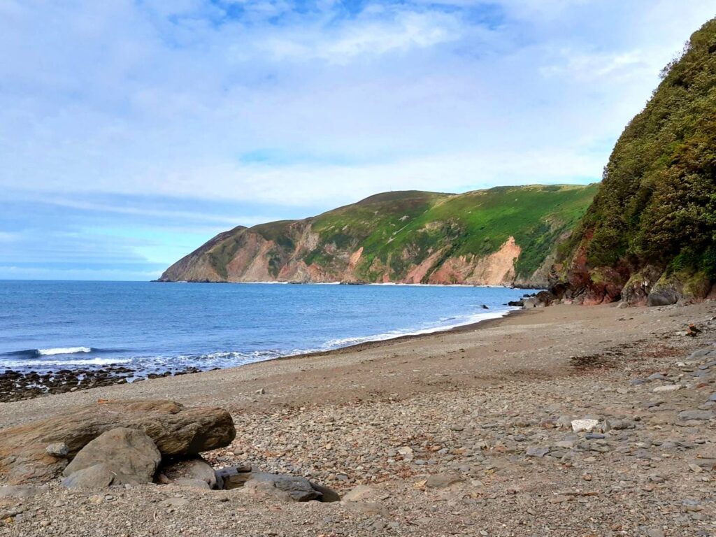 Lynmouth Beach with rock pools and views across the Bristol Channel