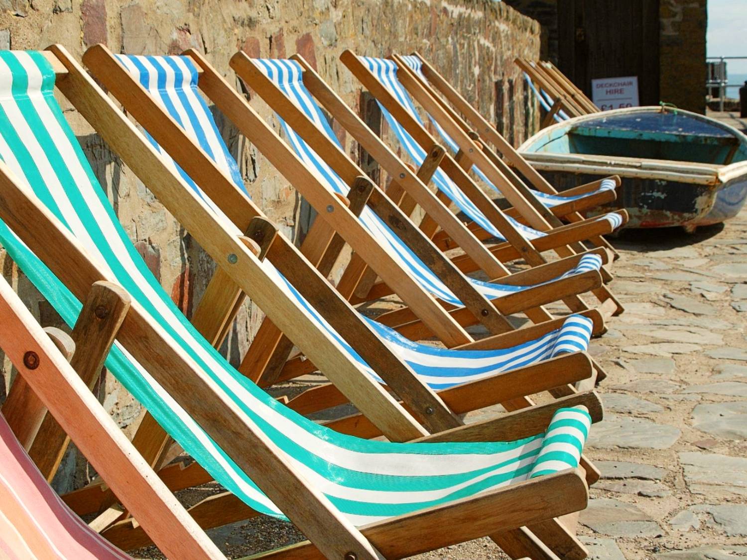 Deck chairs on Lynmouth harbour wall
