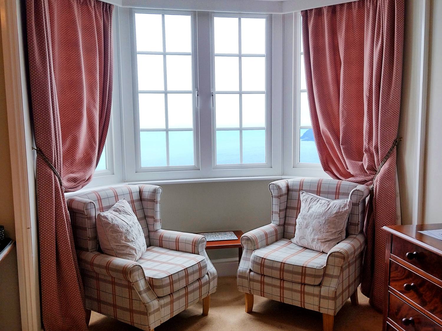 Four Poster Nest Bedroom with bay window and view